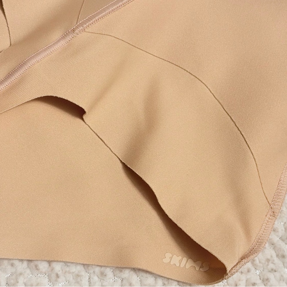 SKIMS Sculpt High-Waist Thong ULTRA STRONG support. SAND - Picture 7 of 14